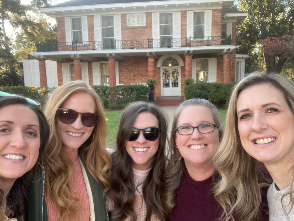 Friends in front of the Steel Magnolia's House